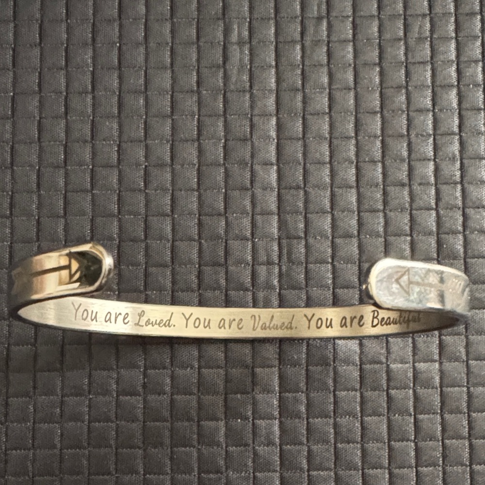 Silver Inspirational Cuff Bracelet featuring the engraved messages.